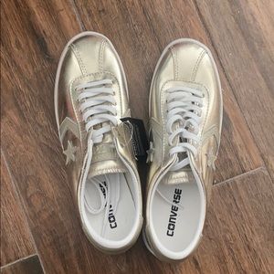 Gold converse sneakers